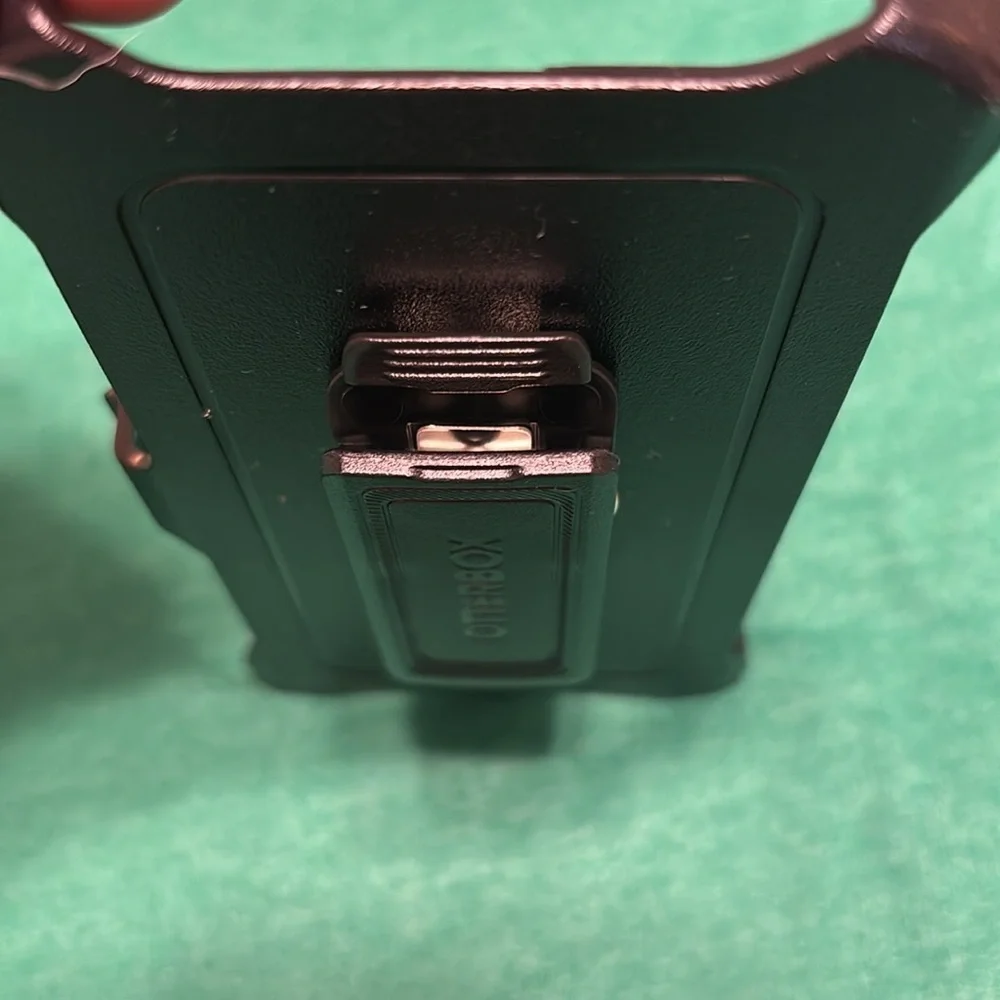 Brand New OtterBox Defender Belt Clip Holster for Apple IPhone 15.
